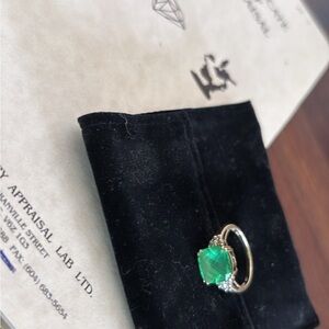 Elegant 10k gold Ring with Green CZ and ten small diamonds